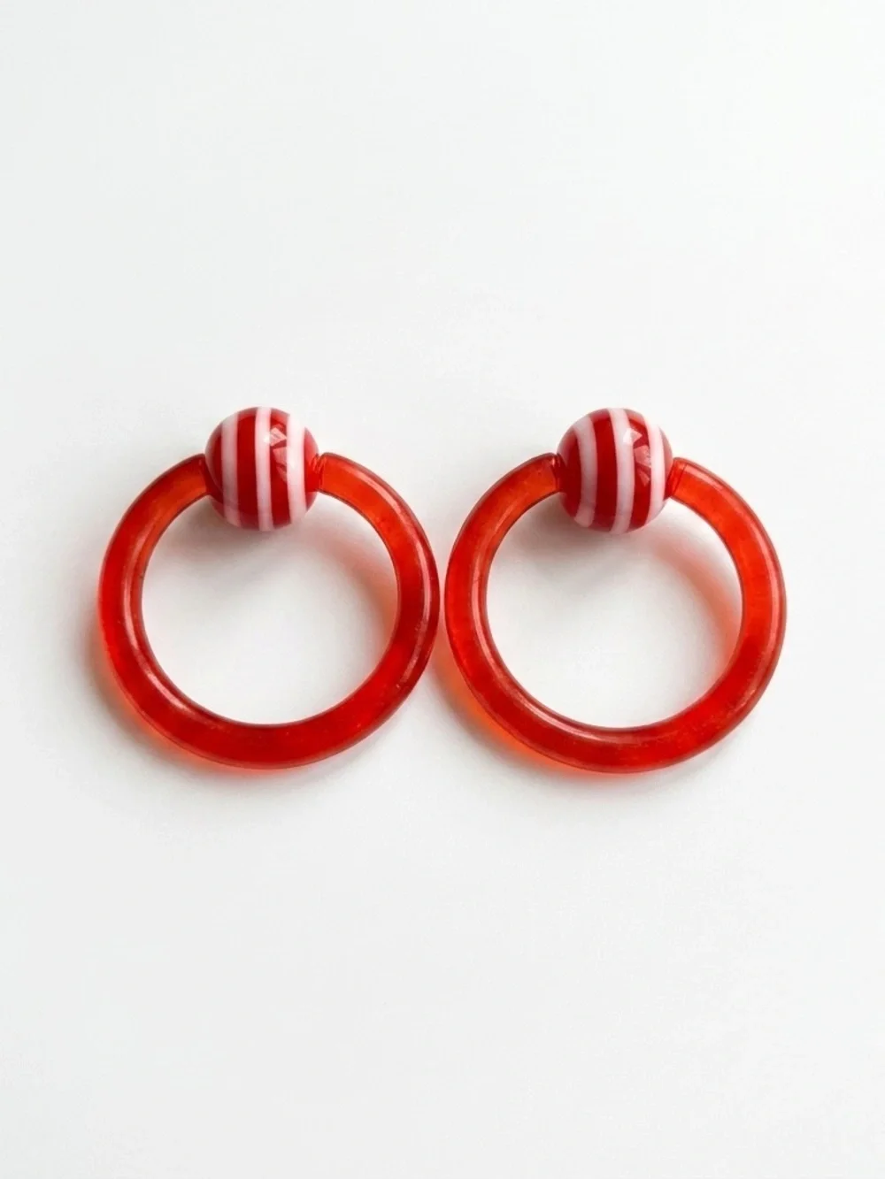 12g 7/16 Captive Bead Ring Pr Red w/ Red & White Striped Beads
